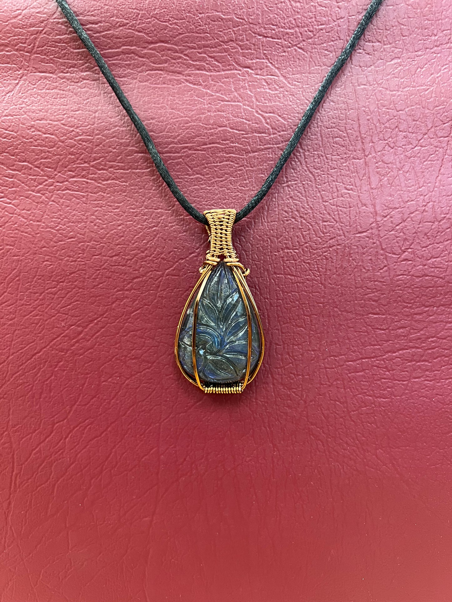 Carved labradorite pendant